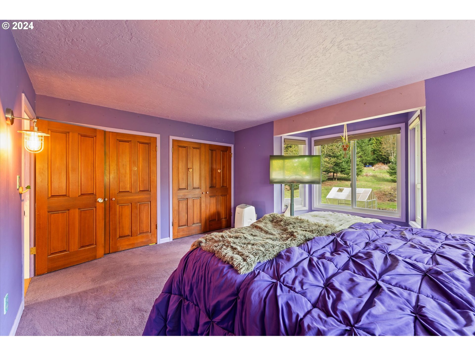 3516 Sunset Way Longview, WA 98632 - Photo 25 of 37 a bedroom with a bed and a window