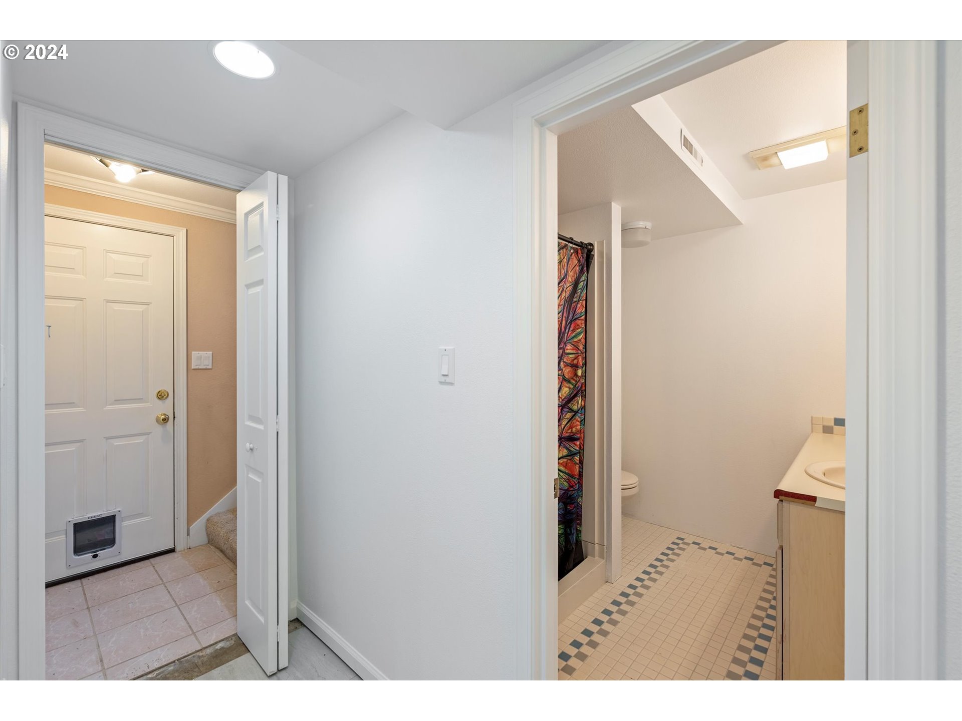 3516 Sunset Way Longview, WA 98632 - Photo 27 of 37 a view of a hallway with wooden floor and staircase