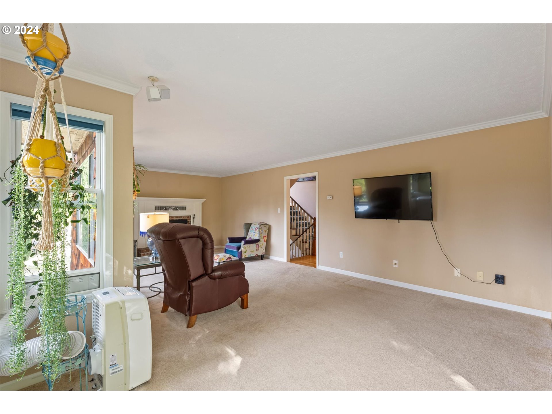 3516 Sunset Way Longview, WA 98632 - Photo 6 of 37 a living room with furniture and a flat screen tv