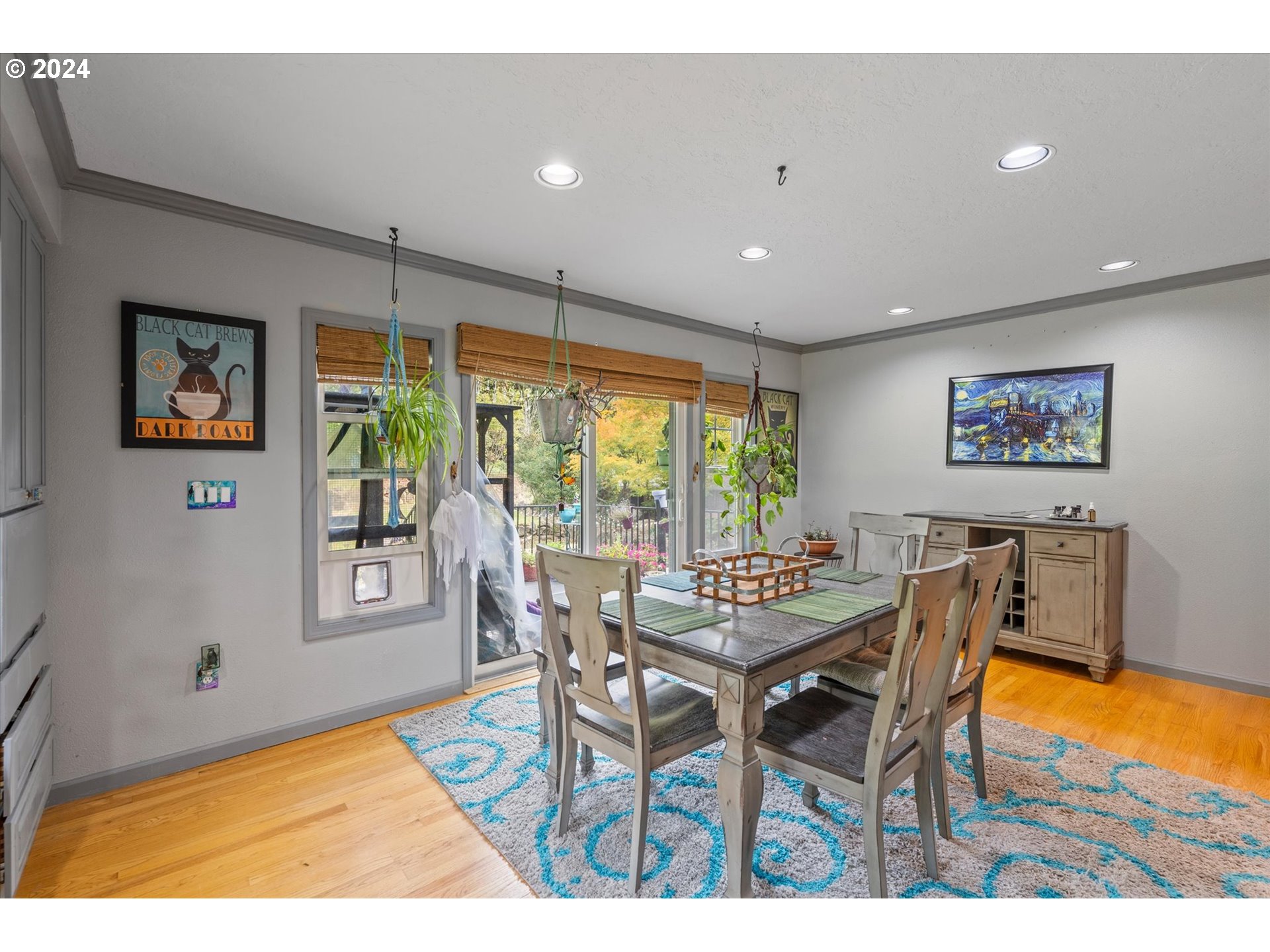 3516 Sunset Way Longview, WA 98632 - Photo 10 of 37 a dining room with furniture and a floor to ceiling window