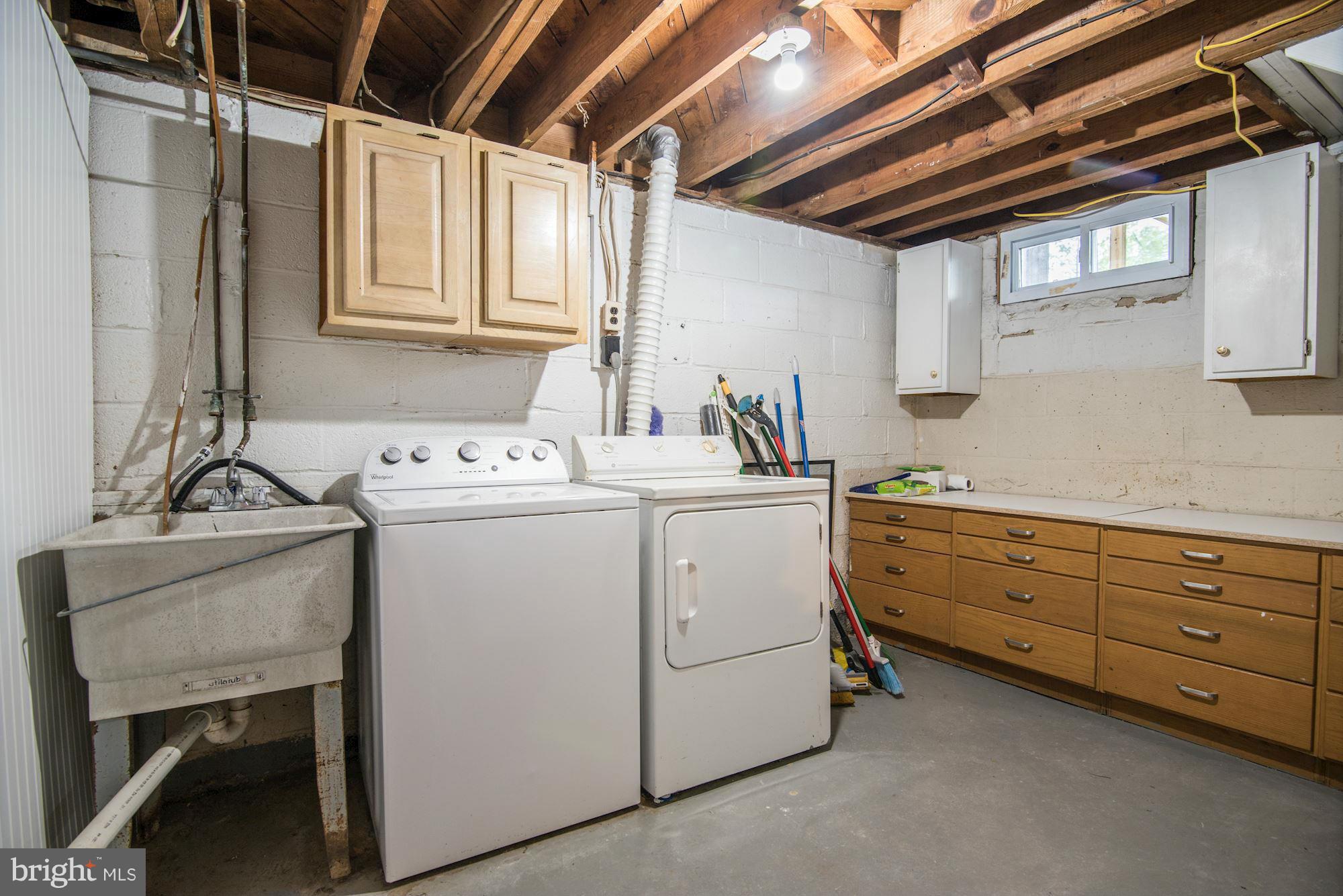 12314 Charles Road Silver Spring, MD 20906 - Photo 22 of 30 Large Storage / Laundry Room with Work Area