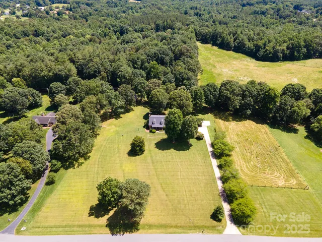 a view of lake with green space