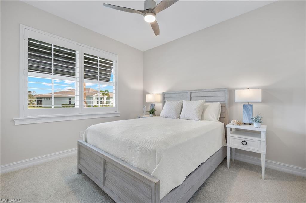 318 Deauville Loop Naples, FL 34114 - Photo 6 of 21 a bedroom with a bed and a window