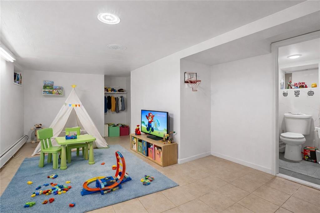 883 Manor Road Staten Island, NY 10314 - Photo 23 of 24 a children room with toys