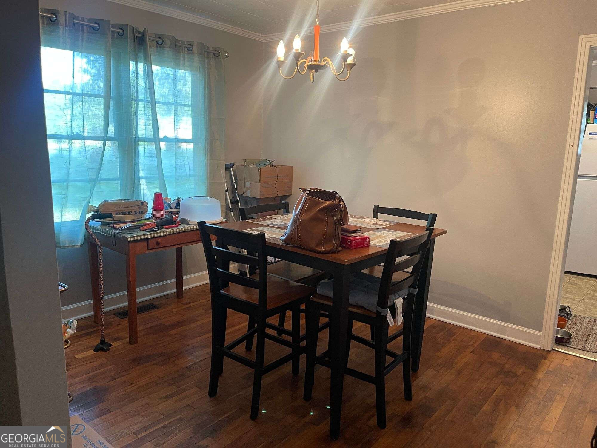 646 North Main Street Swainsboro, GA 30401 - Photo 13 of 27 a view of a dining room with furniture and wooden floor