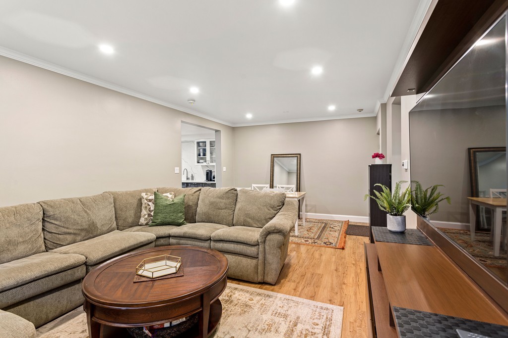 412 Langley Road, Unit 3 Newton, MA 02459 - Photo 12 of 30 a living room with furniture and a table