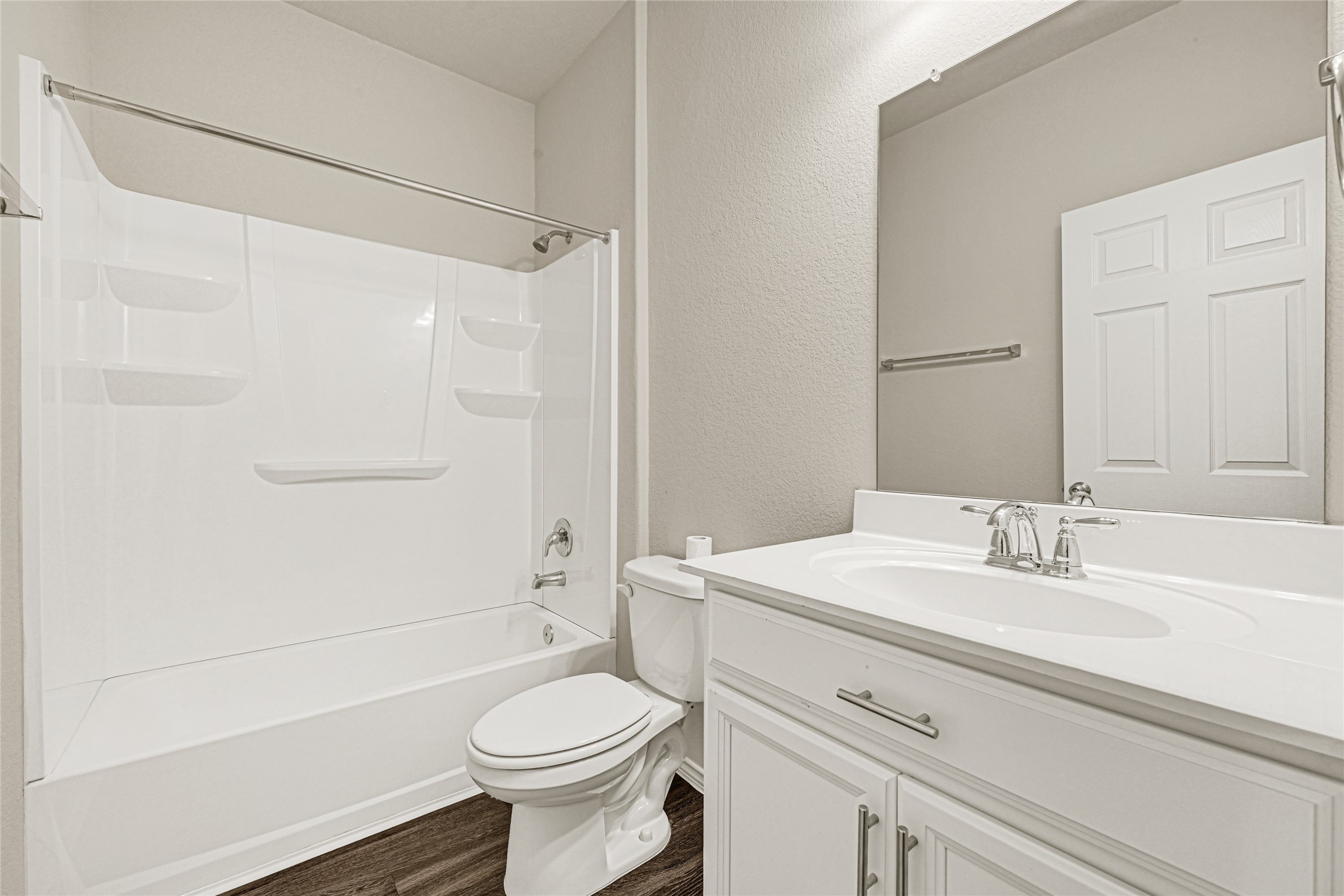 2210 Timberland Country Court Conroe, TX 77304 - Photo 17 of 25 a bathroom with a sink a toilet and shower