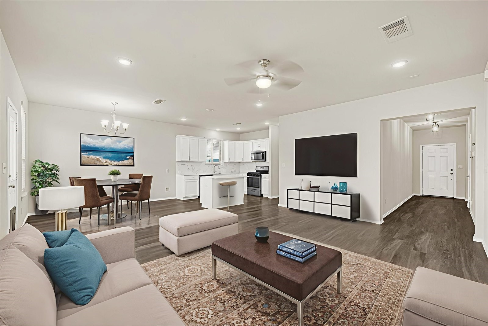 2210 Timberland Country Court Conroe, TX 77304 - Photo 5 of 25 a living room with furniture and a flat screen tv