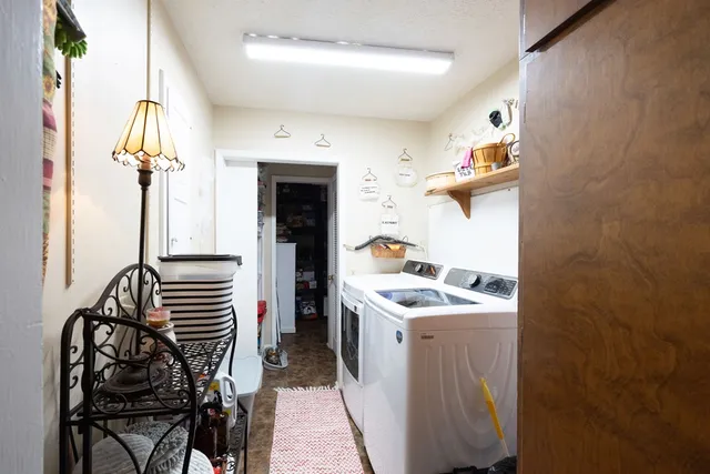 a kitchen with sink cabinets and stove