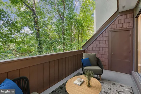 a view of a chair in the balcony