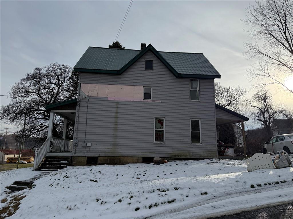 300 Hansen Avenue Butler, PA 16001 - Photo 2 of 10 a front view of a house with a wooden fence