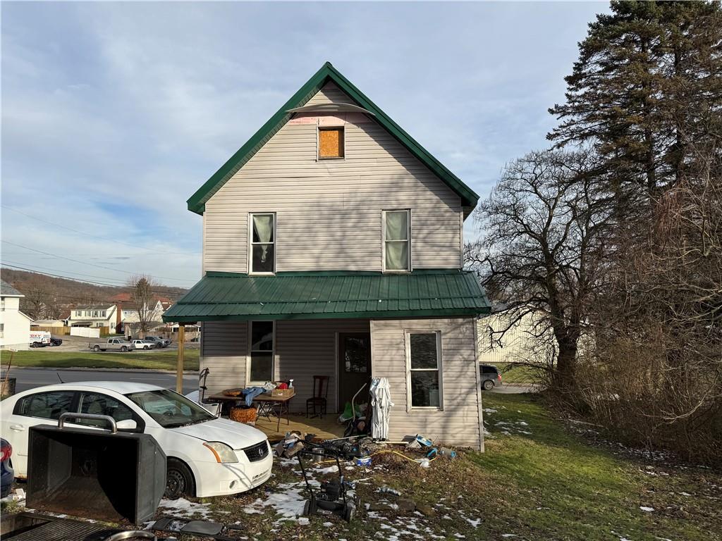 300 Hansen Avenue Butler, PA 16001 - Photo 4 of 10 a front view of a house with parking space