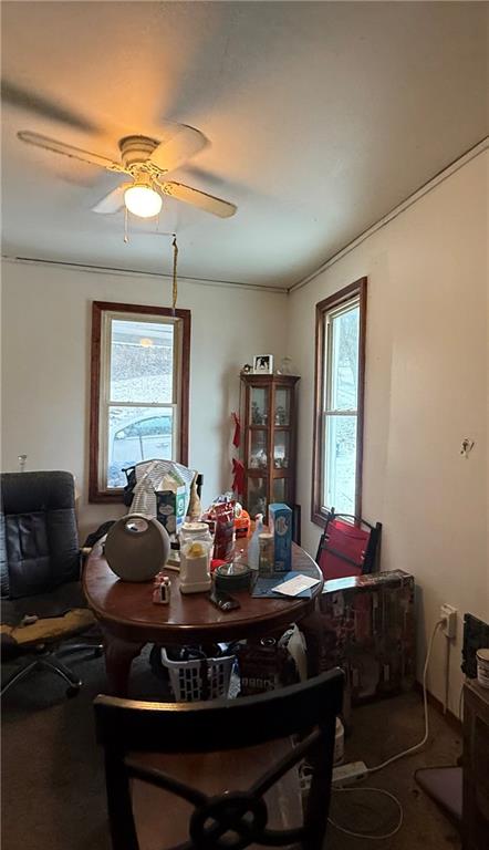 300 Hansen Avenue Butler, PA 16001 - Photo 7 of 10 a living room with furniture a window and a chandelier