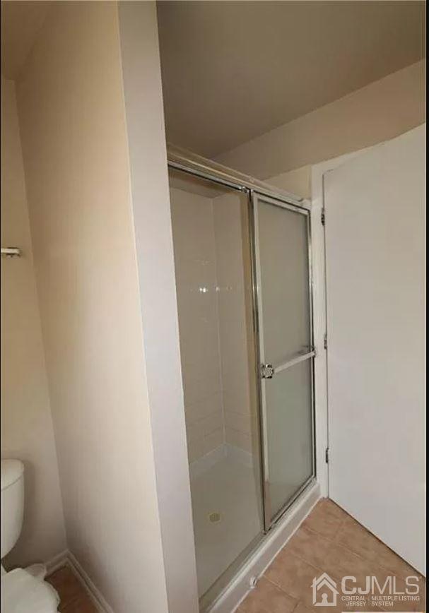 1412 Plymouth Road North Brunswick, NJ 08902 - Photo 13 of 18 a bathroom with a glass door shower