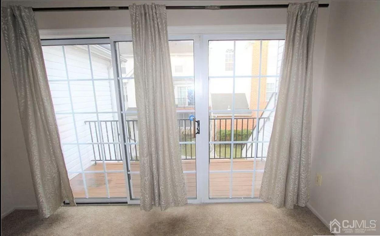 1412 Plymouth Road North Brunswick, NJ 08902 - Photo 15 of 18 a view of an empty room with a window