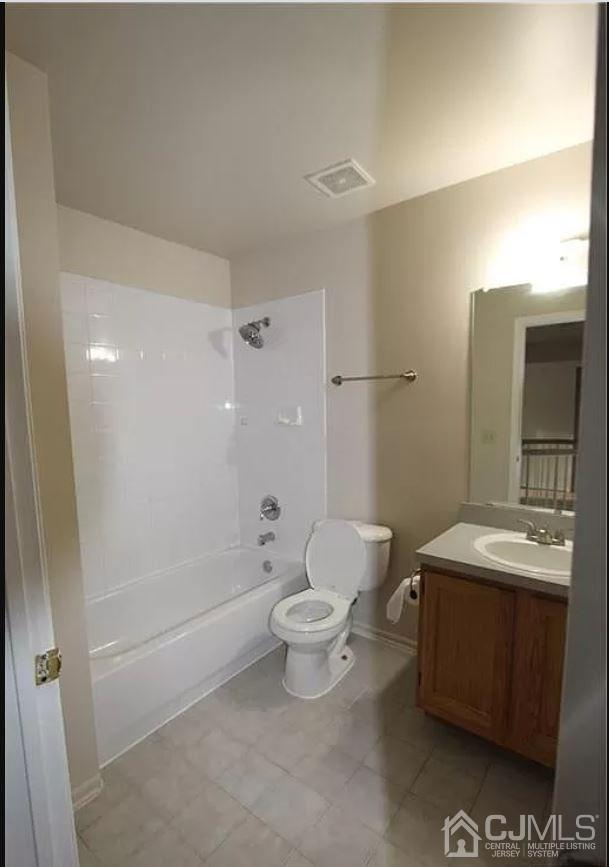 1412 Plymouth Road North Brunswick, NJ 08902 - Photo 18 of 18 a bathroom with a sink a toilet and shower