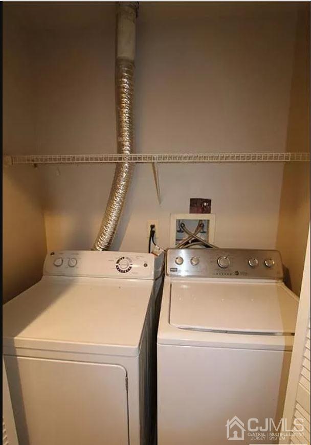 1412 Plymouth Road North Brunswick, NJ 08902 - Photo 10 of 18 a utility room with dryer and washer