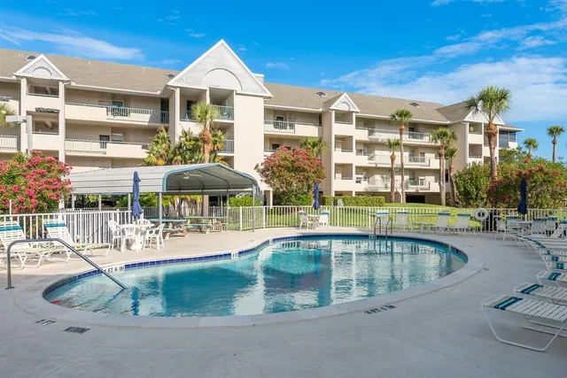 a large white building with a white roof