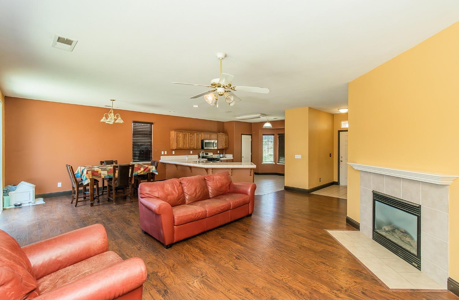 2666 Tammy Street Selma, CA 93662 - Photo 5 of 22 a living room with furniture and a fireplace