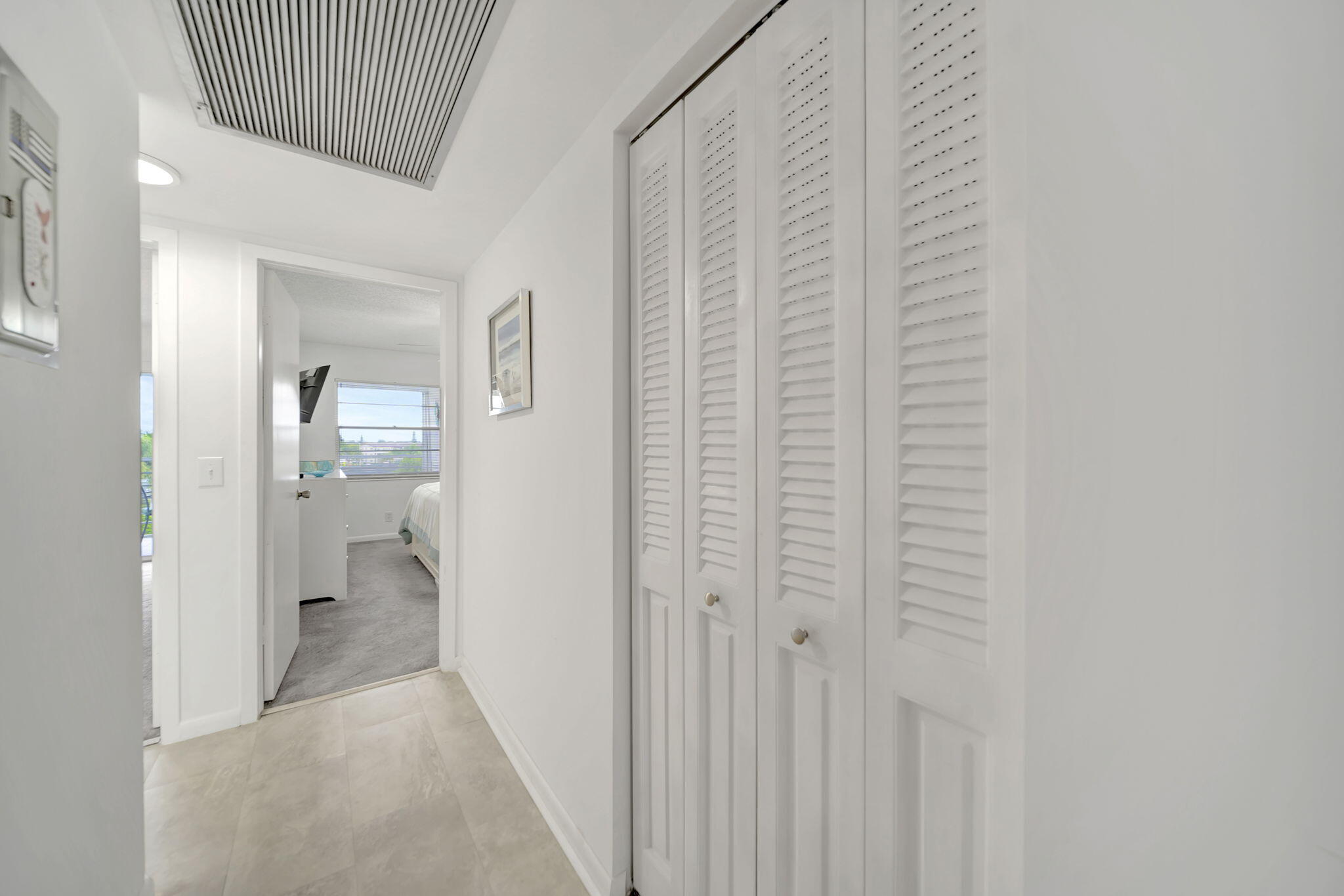 4039 Rexford A, Unit C Boca Raton, FL 33434 - Photo 21 of 87 Hallway closet for extra storage space