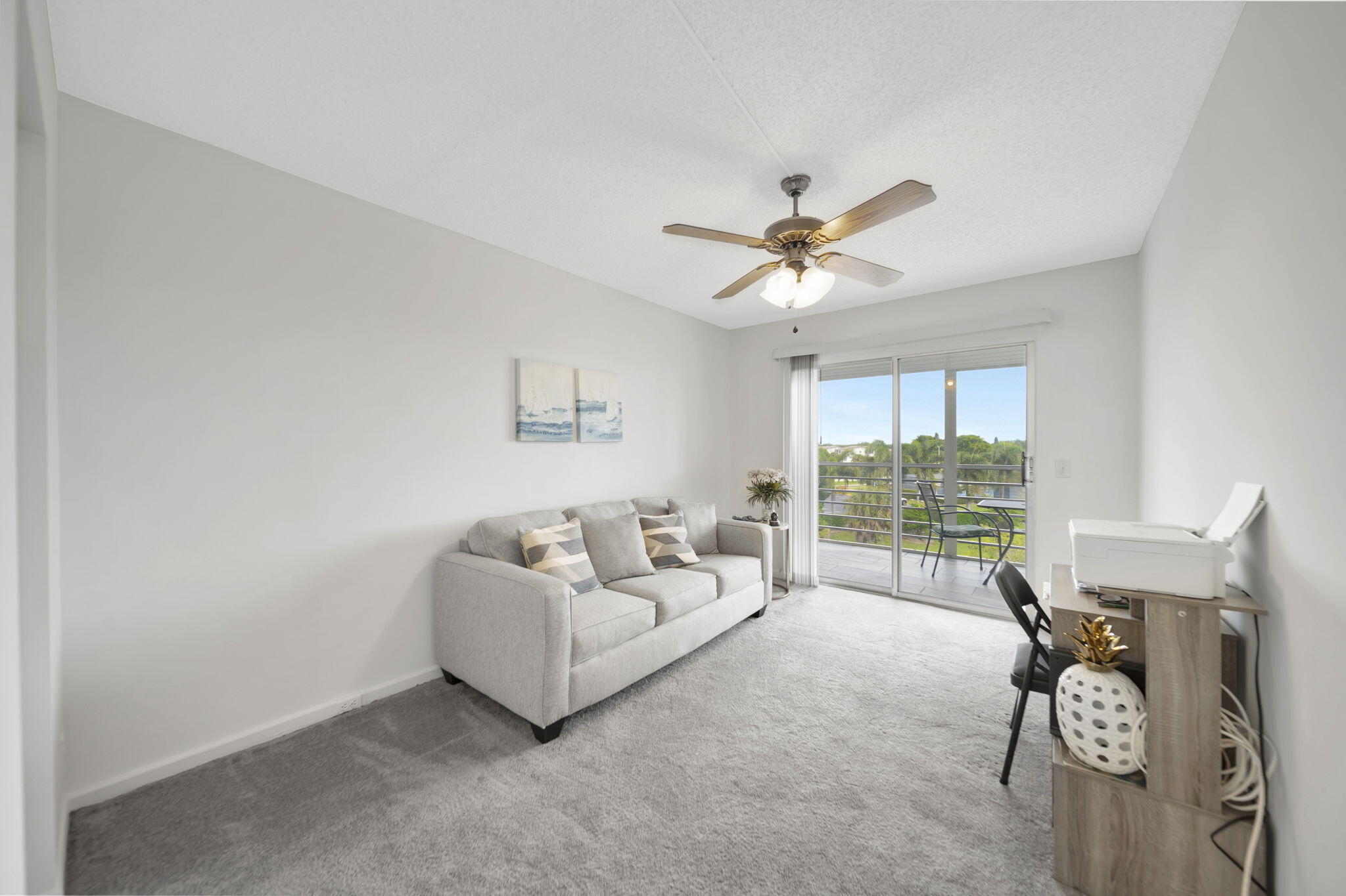 4039 Rexford A, Unit C Boca Raton, FL 33434 - Photo 28 of 87 Ceiling fan plus lake view