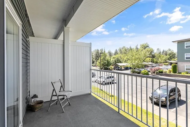 a view of balcony with furniture