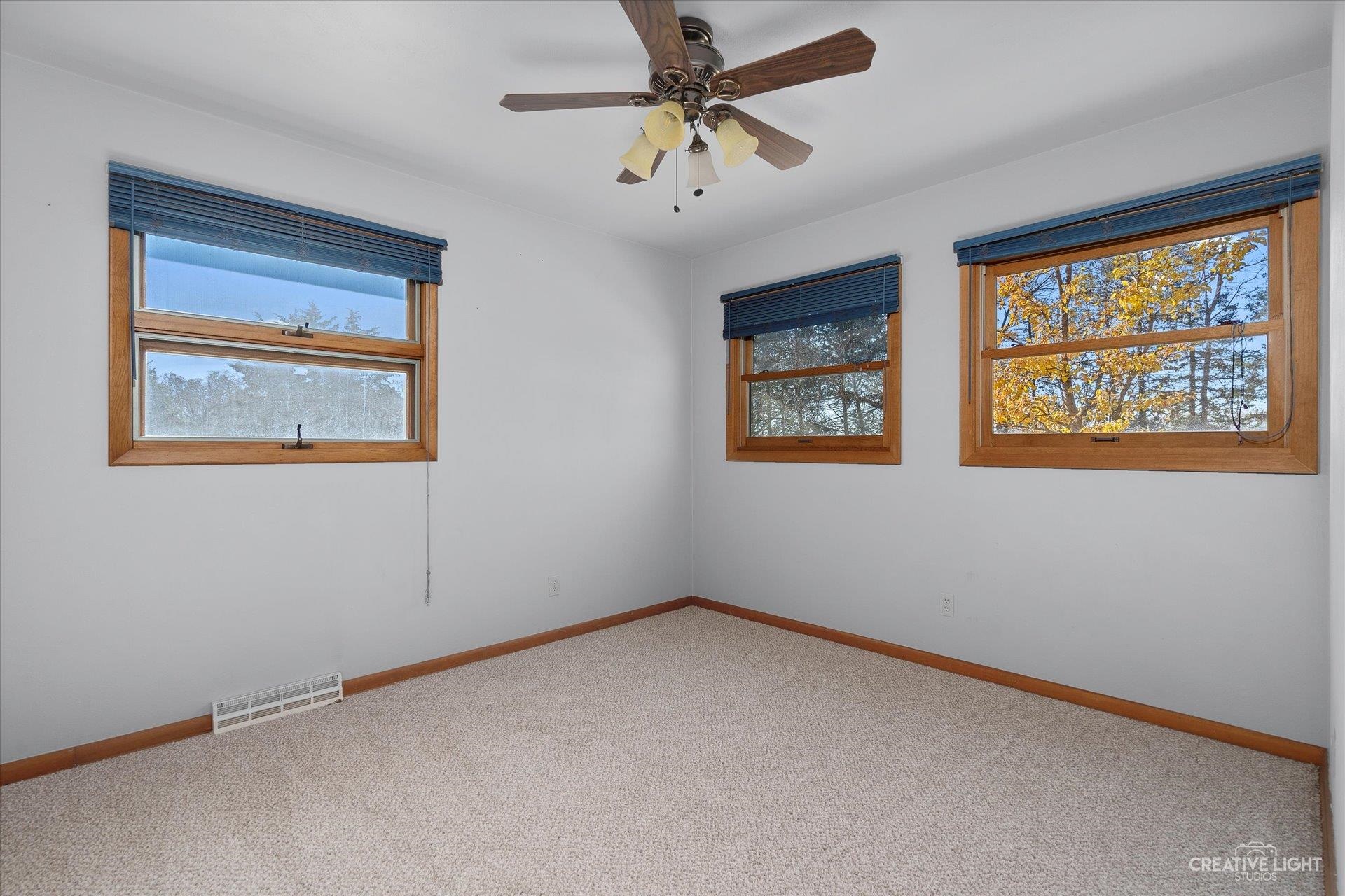 7927 Walnut Street Dixon, IL 61021 - Photo 15 of 33 a view of an empty room with a window