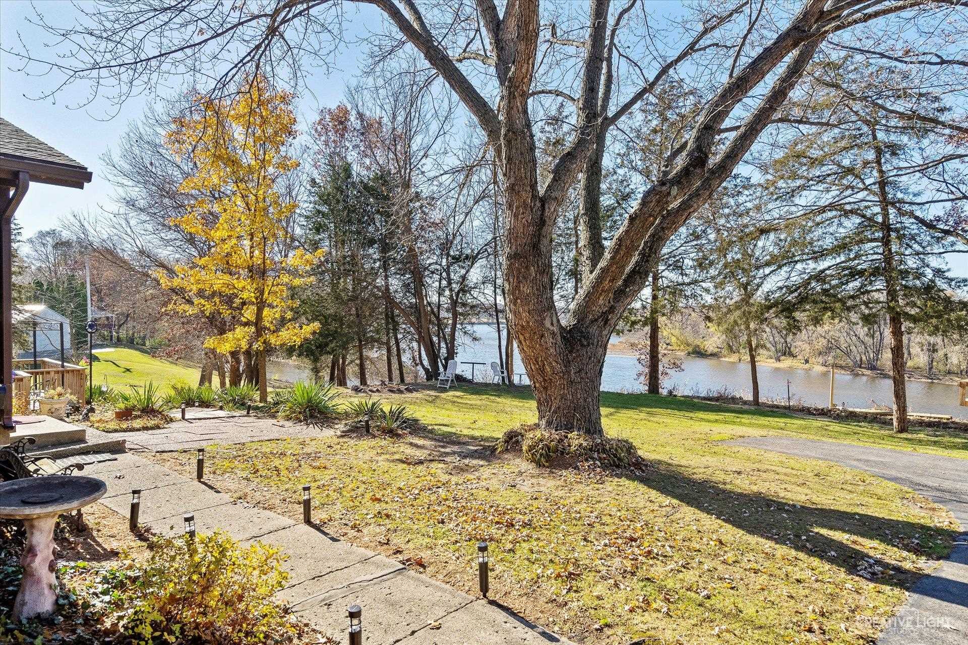 7927 Walnut Street Dixon, IL 61021 - Photo 2 of 33 a view of a yard with a trees