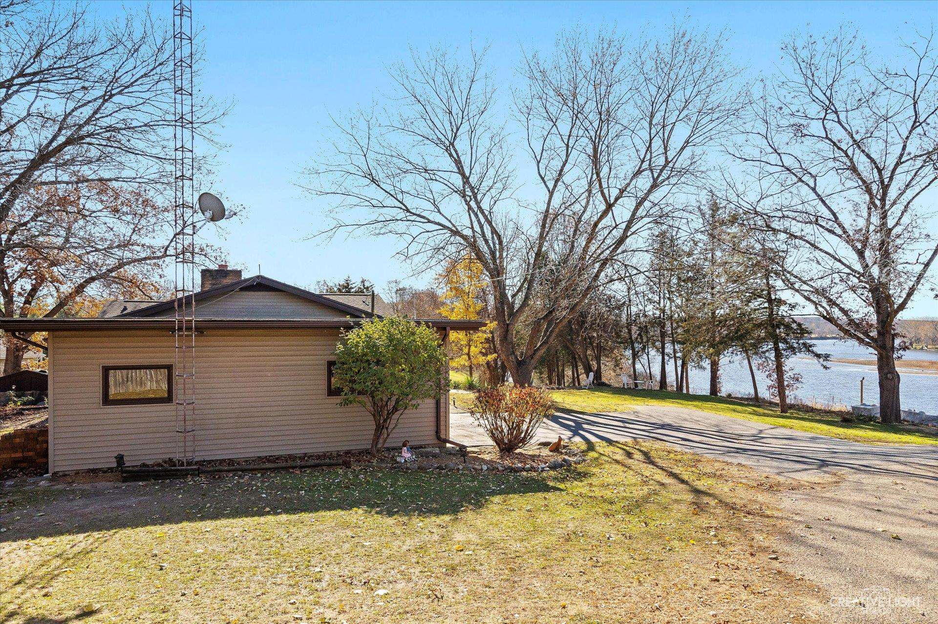 7927 Walnut Street Dixon, IL 61021 - Photo 25 of 33 a view of a yard with a house in the background