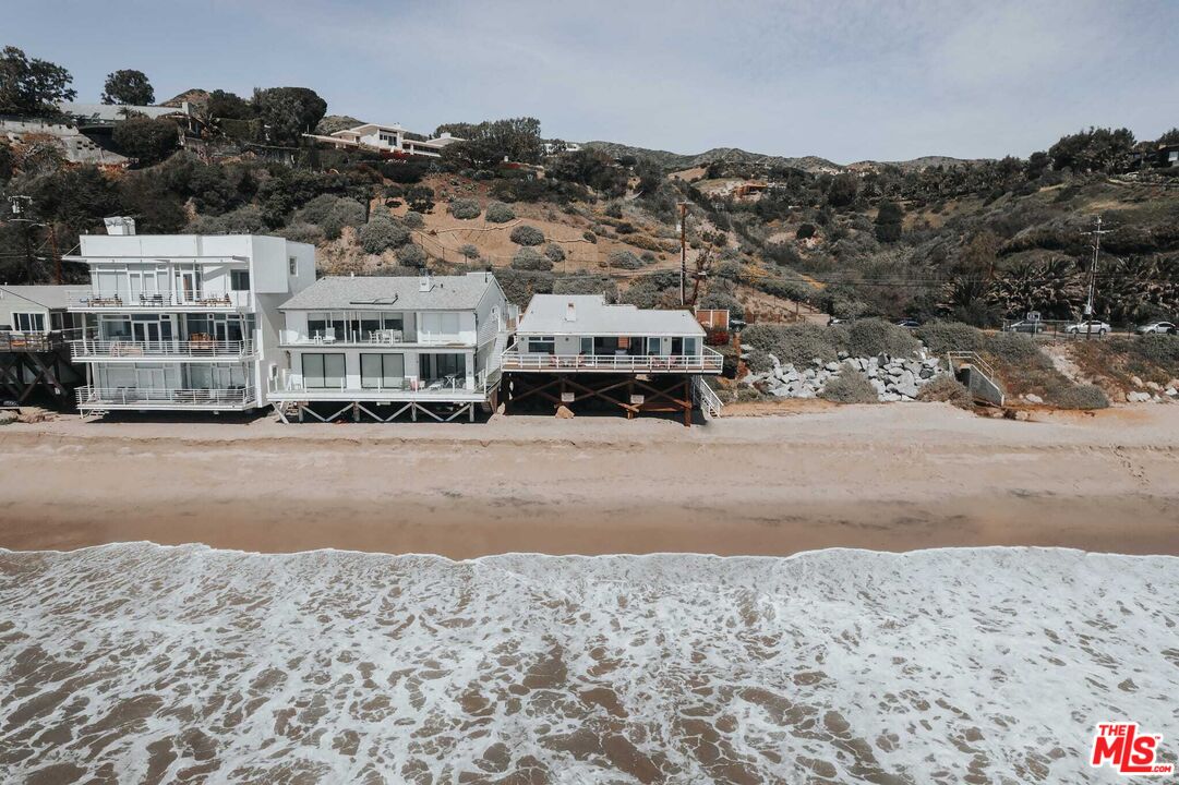 24742 Malibu Road Malibu, CA 90265 - Photo 14 of 18 a view of street with large trees