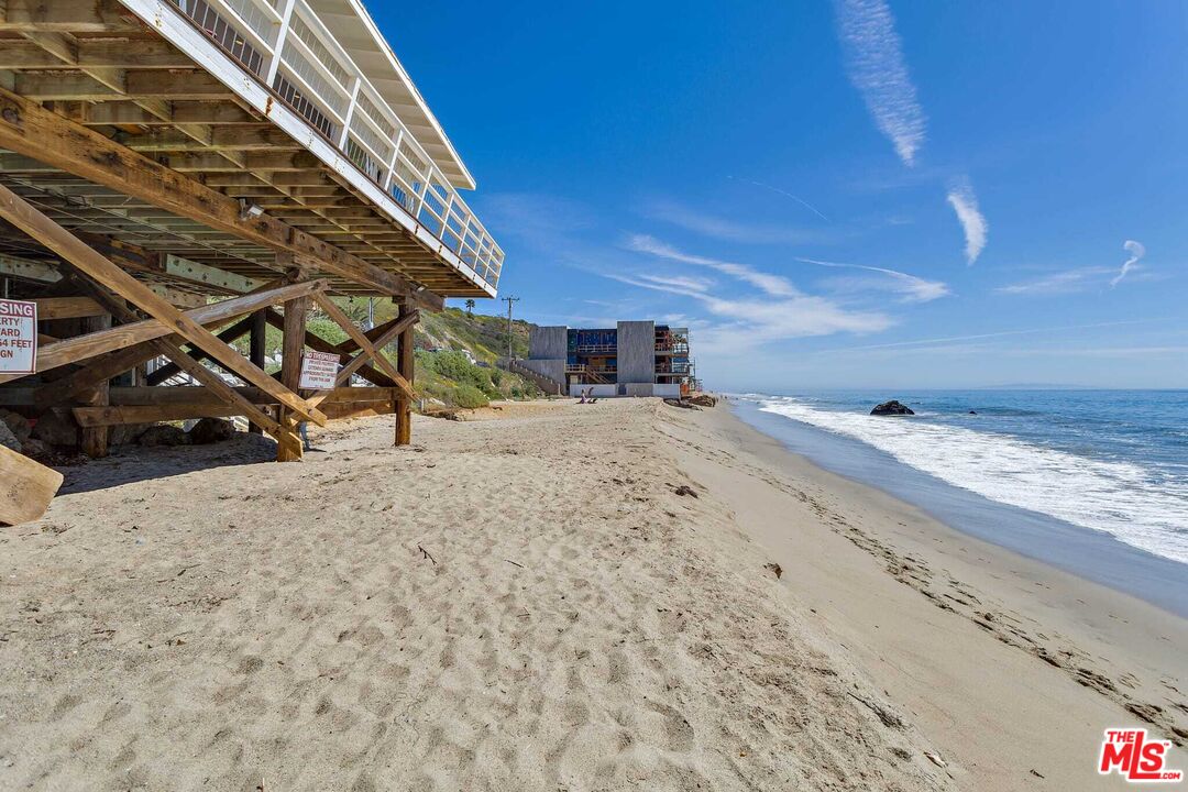 24742 Malibu Road Malibu, CA 90265 - Photo 4 of 18 a view of a dry yard with wooden fence