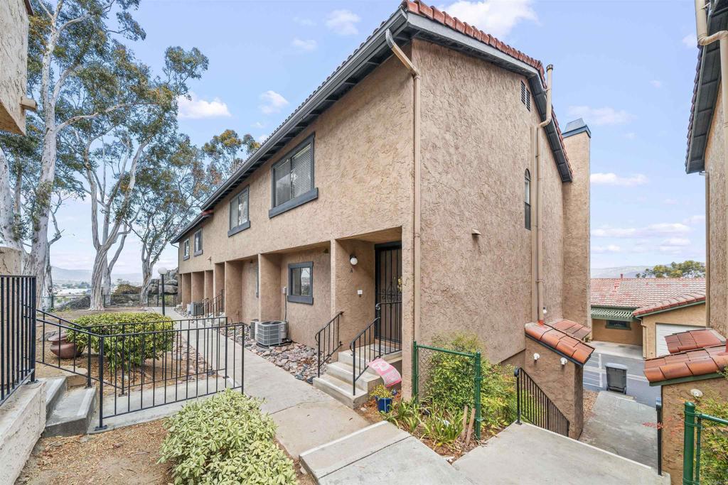 10775 Tamar Terrace, Unit A Santee, CA 92071 - Photo 14 of 38 a backyard of a house with table and chairs
