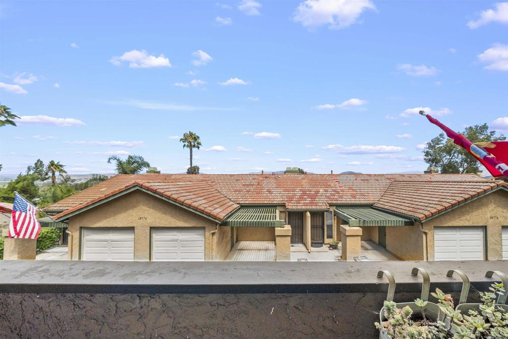 10775 Tamar Terrace, Unit A Santee, CA 92071 - Photo 20 of 38 a house view with a garden space