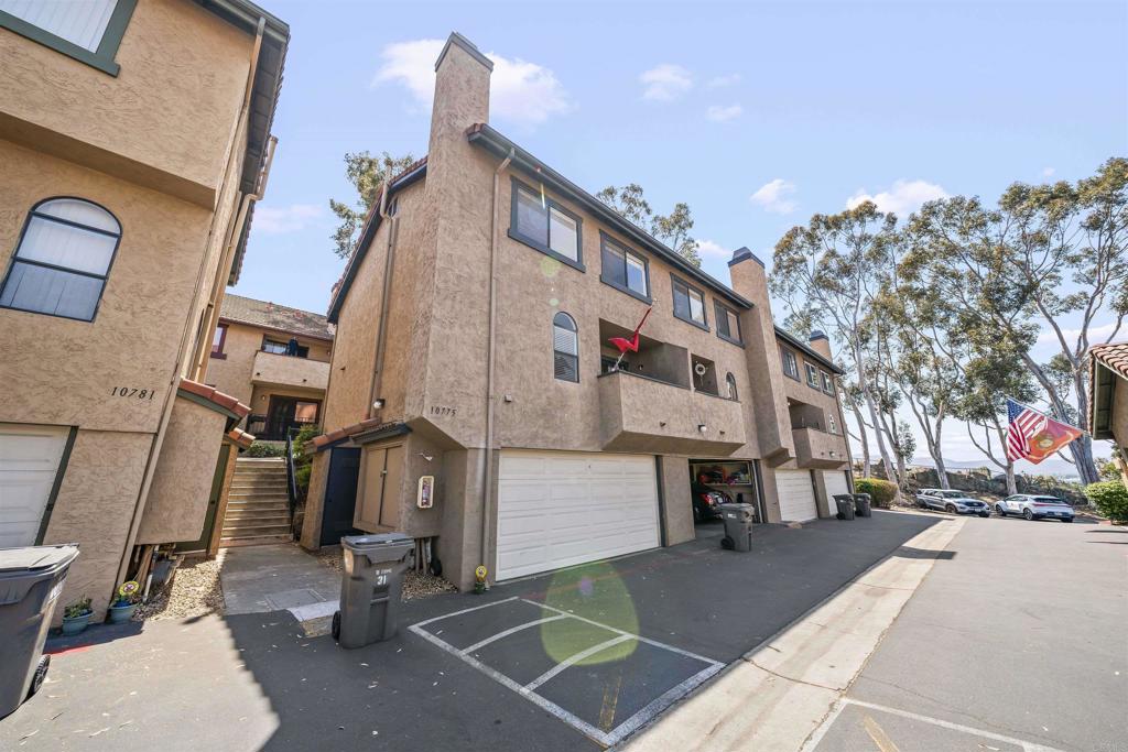 10775 Tamar Terrace, Unit A Santee, CA 92071 - Photo 29 of 38 a building view with a outdoor space