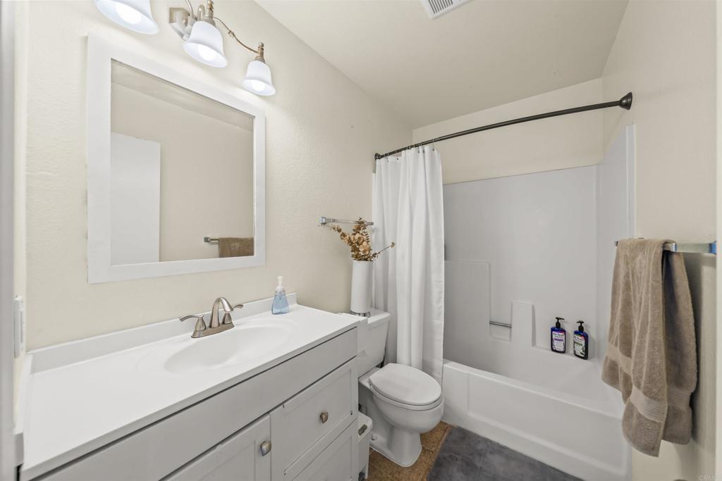 10775 Tamar Terrace, Unit A Santee, CA 92071 - Photo 35 of 38 a bathroom with a sink toilet and shower