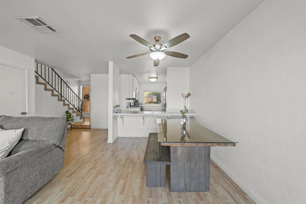 10775 Tamar Terrace, Unit A Santee, CA 92071 - Photo 5 of 38 a living room with furniture and wooden floor
