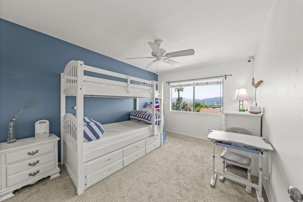 10775 Tamar Terrace, Unit A Santee, CA 92071 - Photo 9 of 38 a bedroom with furniture and a window