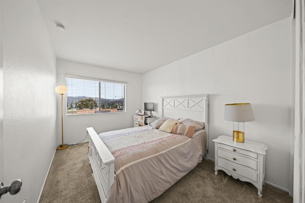 10775 Tamar Terrace, Unit A Santee, CA 92071 - Photo 10 of 38 a bedroom with a bed and a window