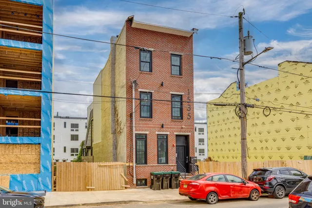a car parked in front of a building