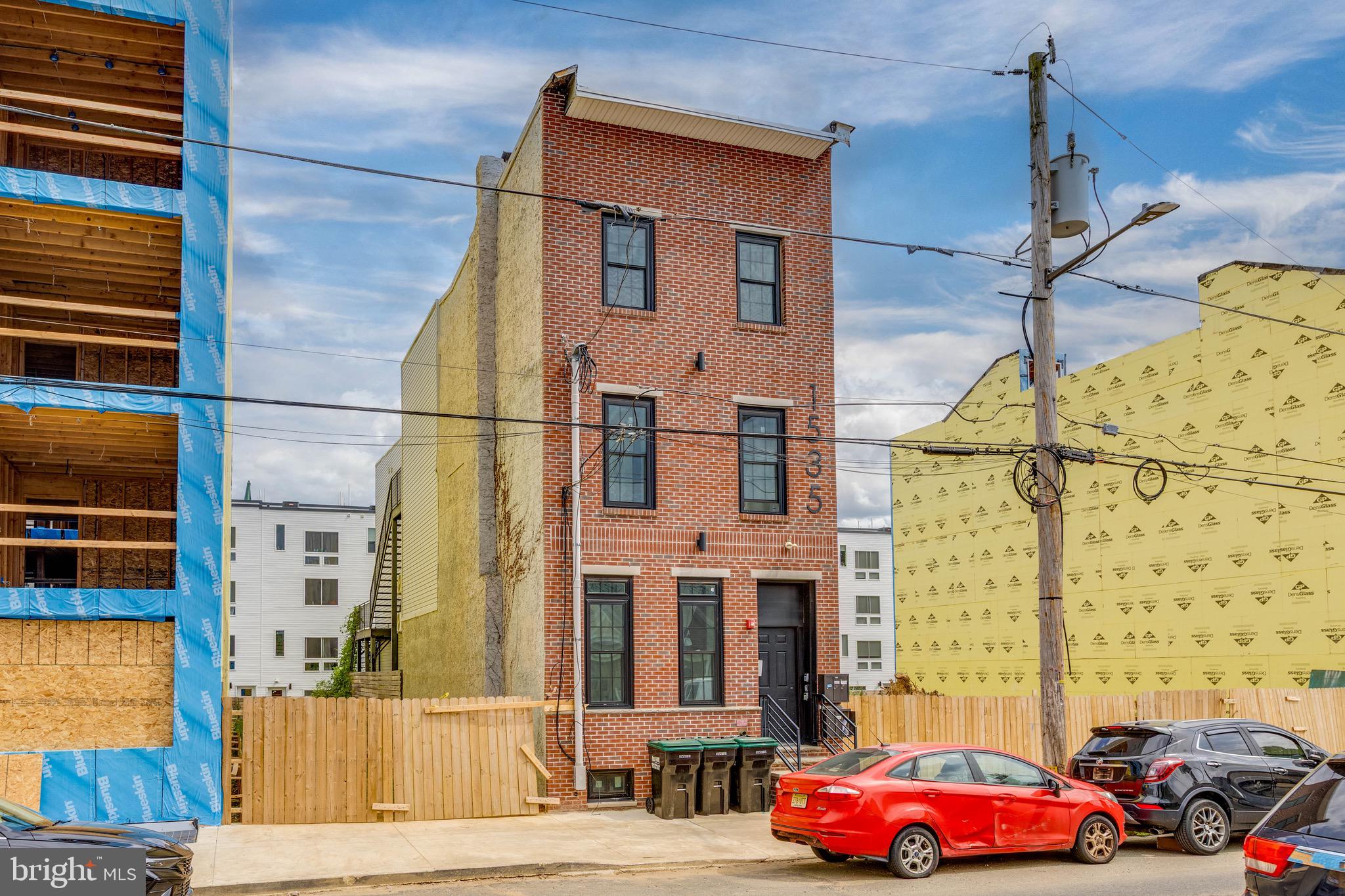 1535 North 6th Street, Unit E Philadelphia, PA 19122 - Photo 11 of 11 a car parked in front of a building
