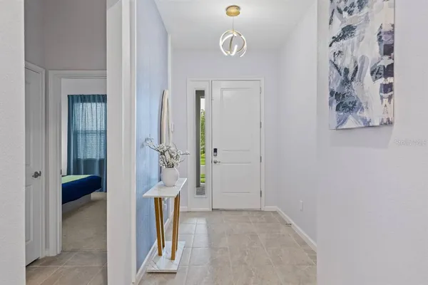 a view of a balcony with chandelier