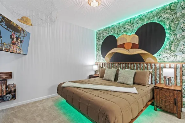 a bed room with a bed and a window