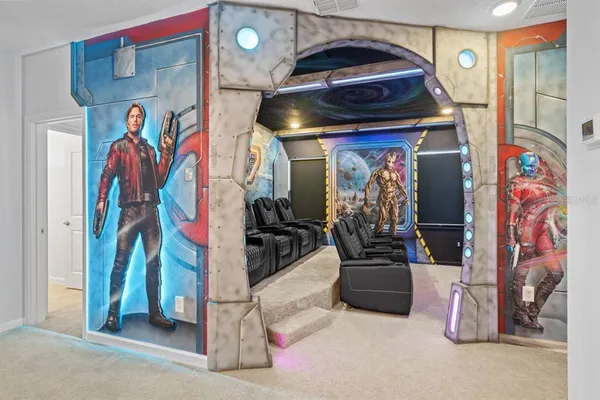 a bedroom with bed and cupboard