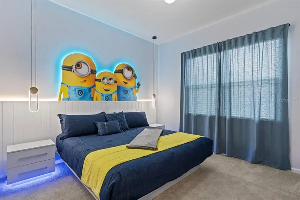 a bathroom with double sink and a mirror