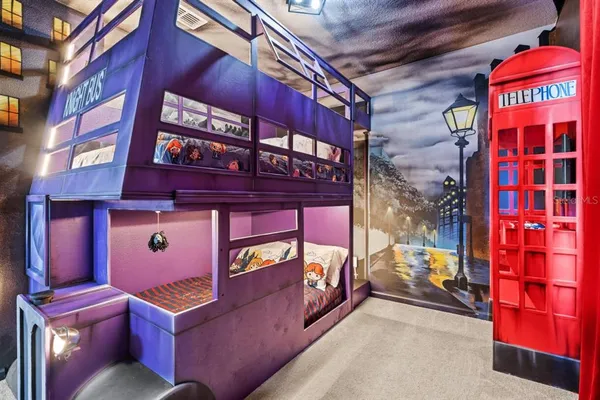 a front view of a multi story building with yard