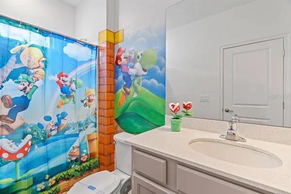 a view of a swimming pool with a patio