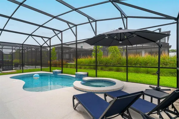 a aerial view of a house with a yard