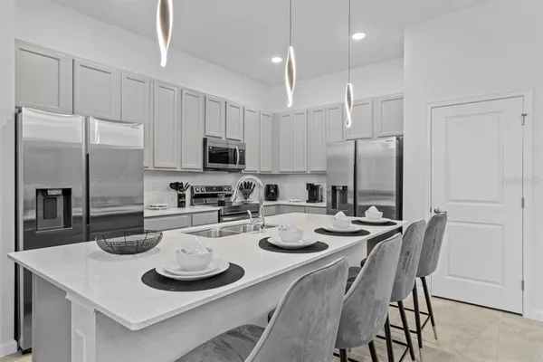 a view of table and chairs in patio