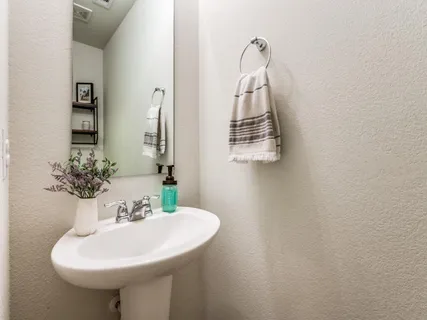 a view of storage and utility room with washer and dryer