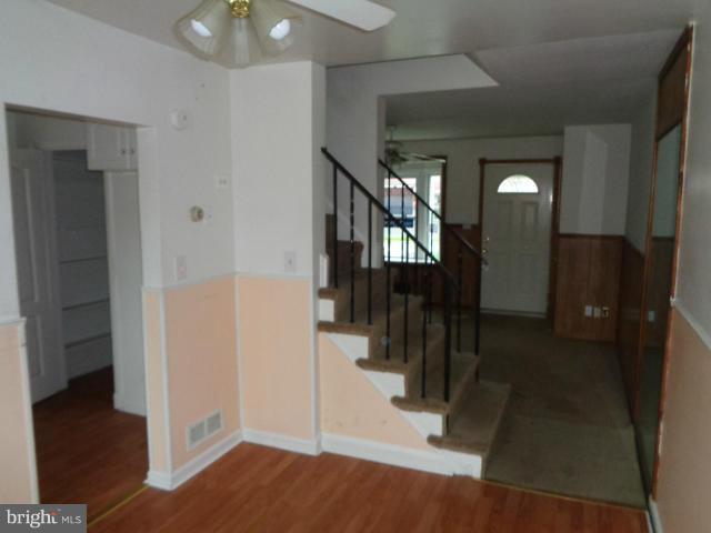 336 Stemmers Run Road Baltimore, MD 21221 - Photo 5 of 13 a view of entryway and hall with wooden floor